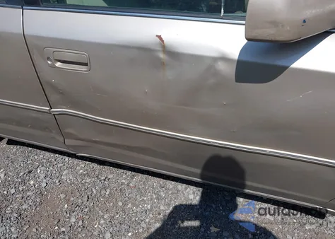 2000 Toyota Avalon Xl z USA, uszkodzony, nr VIN 4T1BF28B8YU067468